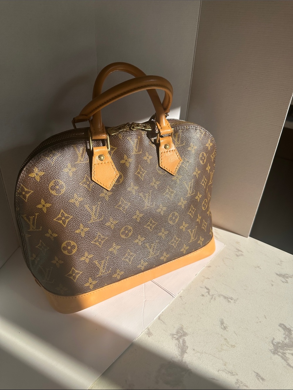 Louis Vuitton Monogram Alma PM
Date Code VI 0935
12” x 9” x 5”